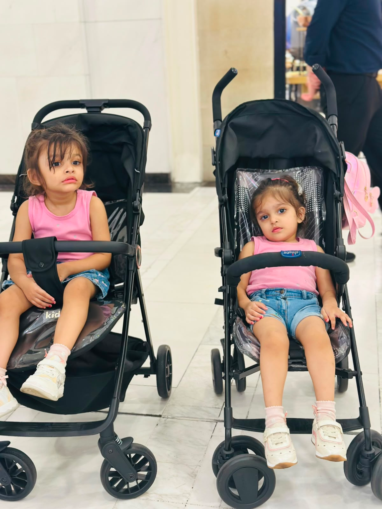 Fatima and Zainab using free strollers provided at a shopping mall in Baku, Azerbaijan